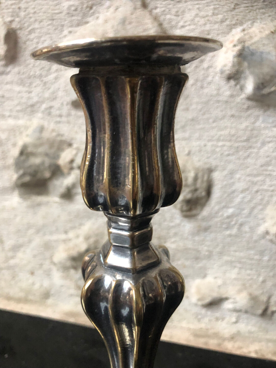 Antique candle holder in silvered bronze
