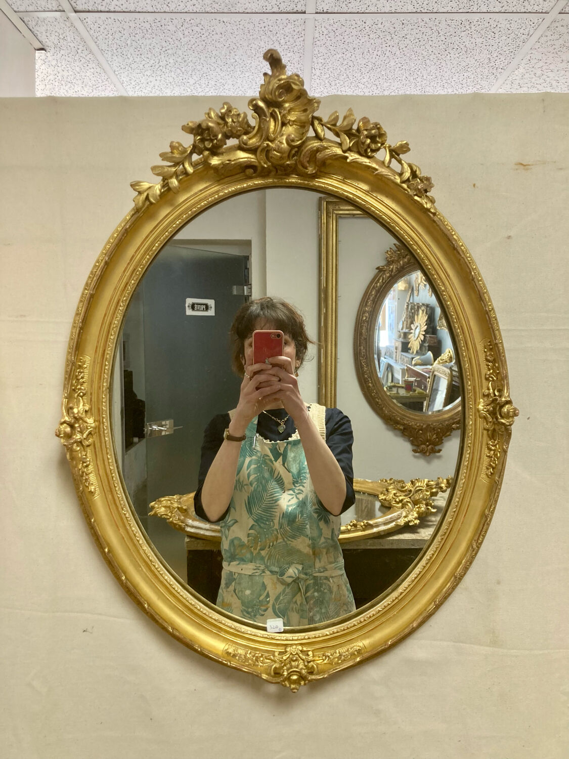 Miroir oval en bois doré 70x49cm