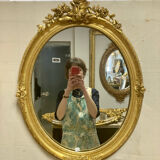 Miroir oval en bois doré 70x49cm