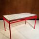 Custom modernist table, steel and earthenware.