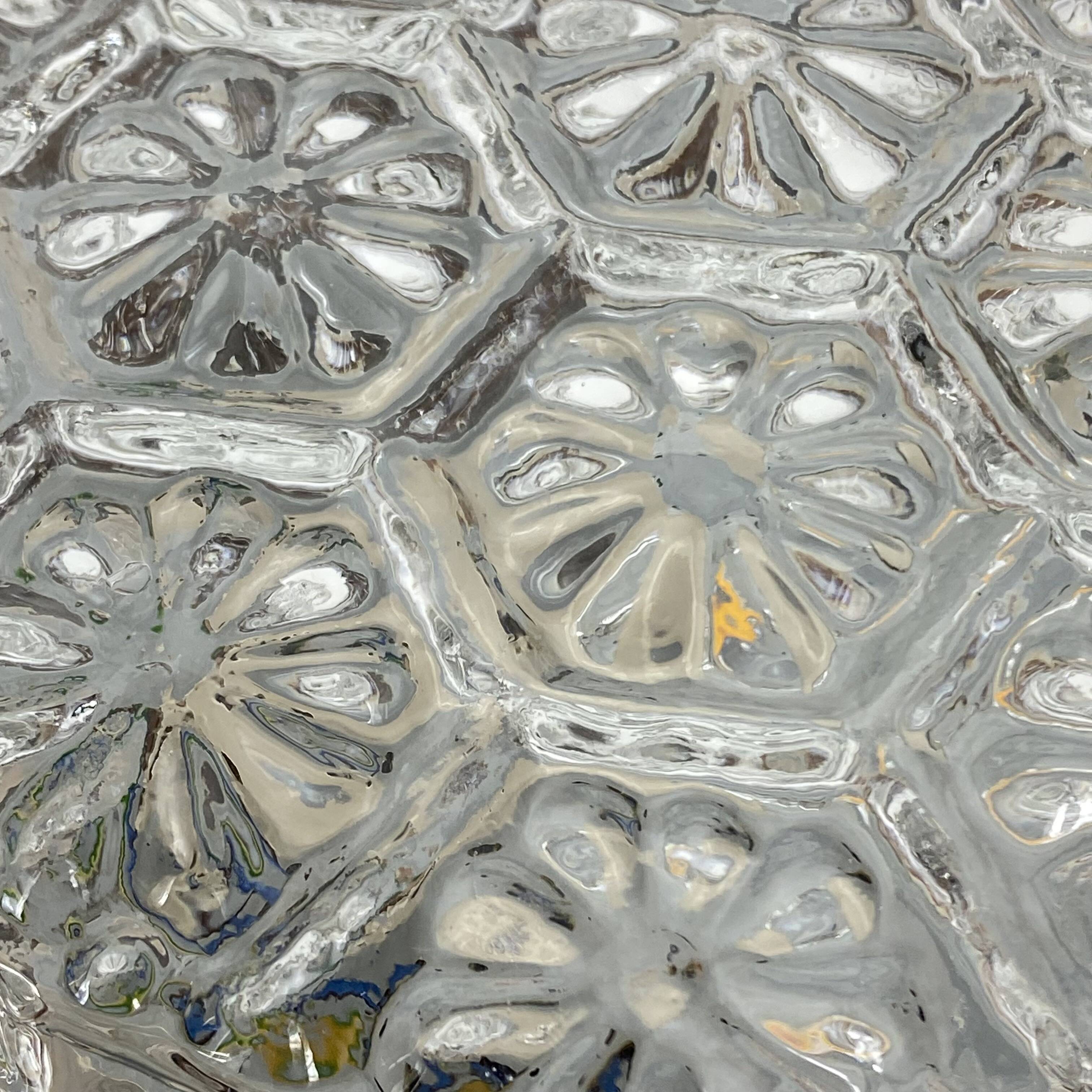 Round wall light ceiling fixture in glass with small vintage flowers from the 1970s and 1980s.