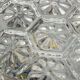 Round wall light ceiling fixture in glass with small vintage flowers from the 1970s and 1980s.