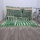 Handmade Moroccan rug from Oued Zam, size 150 x 250 cm.
