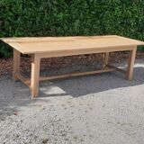 Large solid oak farmhouse table in raw wood