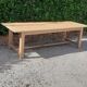 Large solid oak farmhouse table in raw wood