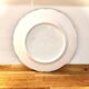 Decorative plate in brown faience
