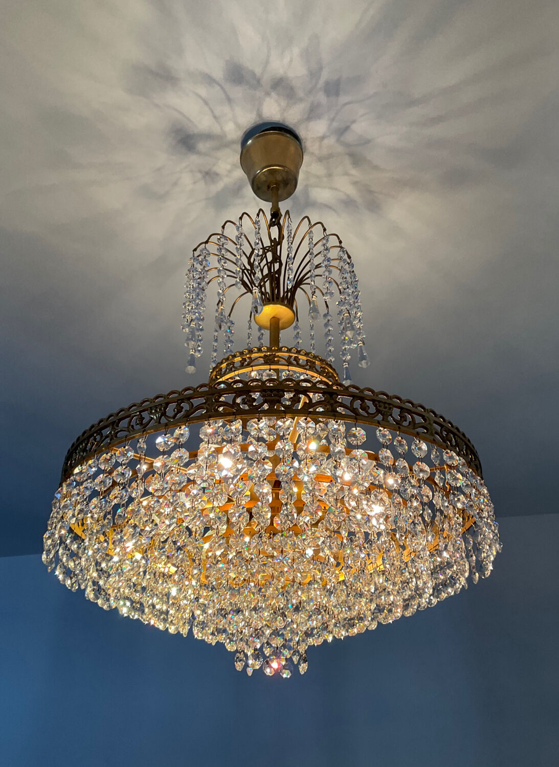 Cascade chandelier with crystal and bronze tassels