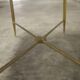 Marble coffee table with brass legs, height 46 cm.