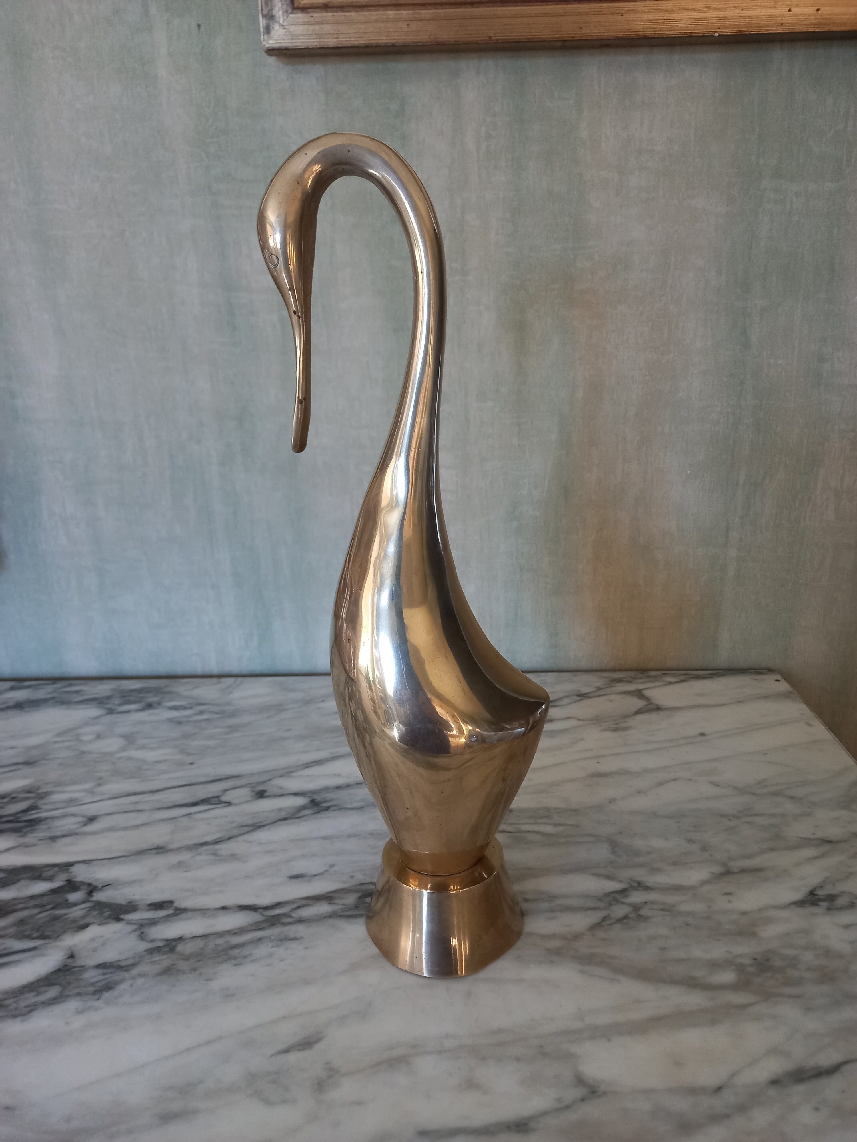 Brass heron