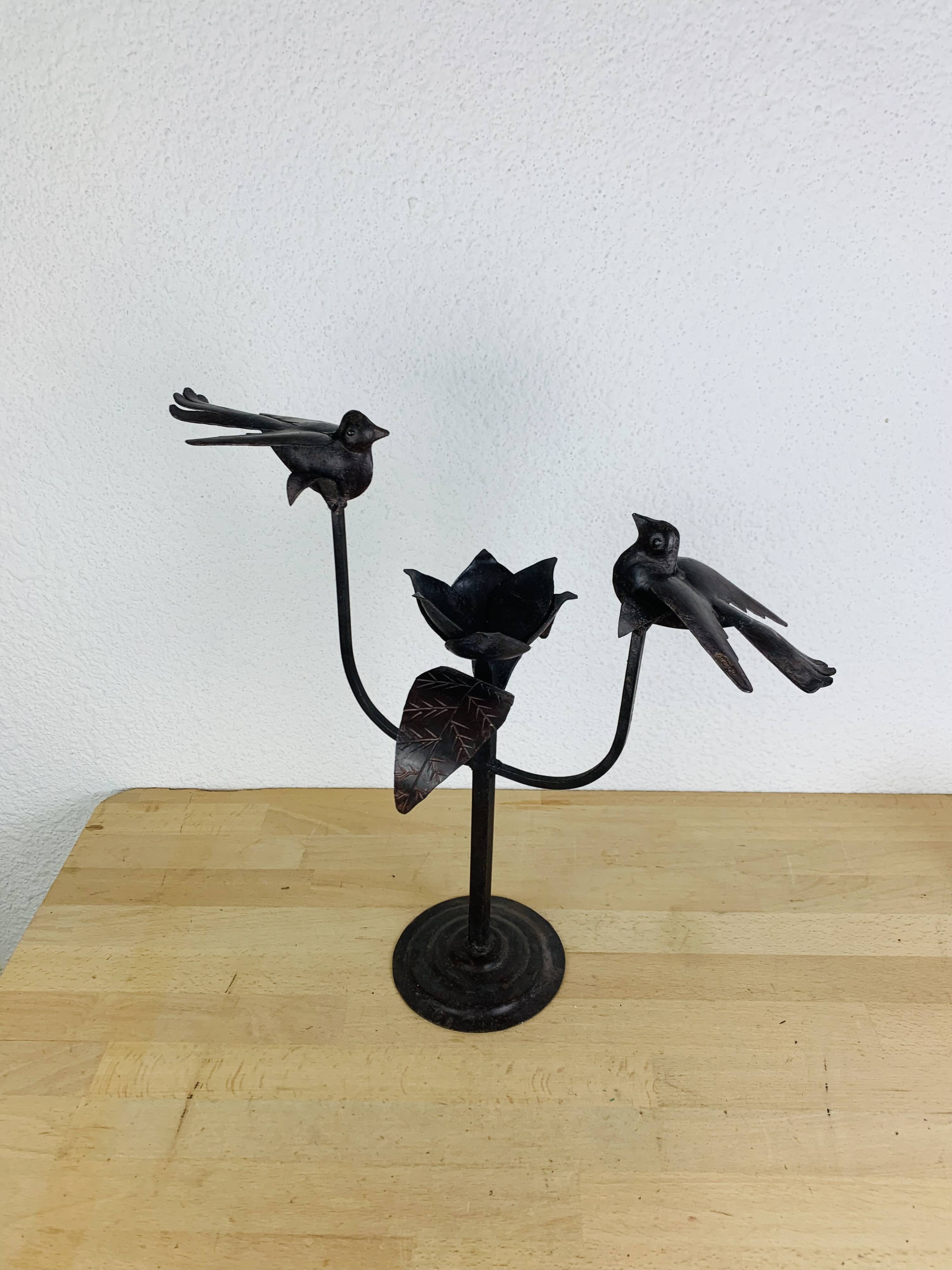 Brutalist wrought iron candle holder with birds