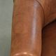 Aged sheepskin clubchair with beautiful vintage patina and comfortable seat