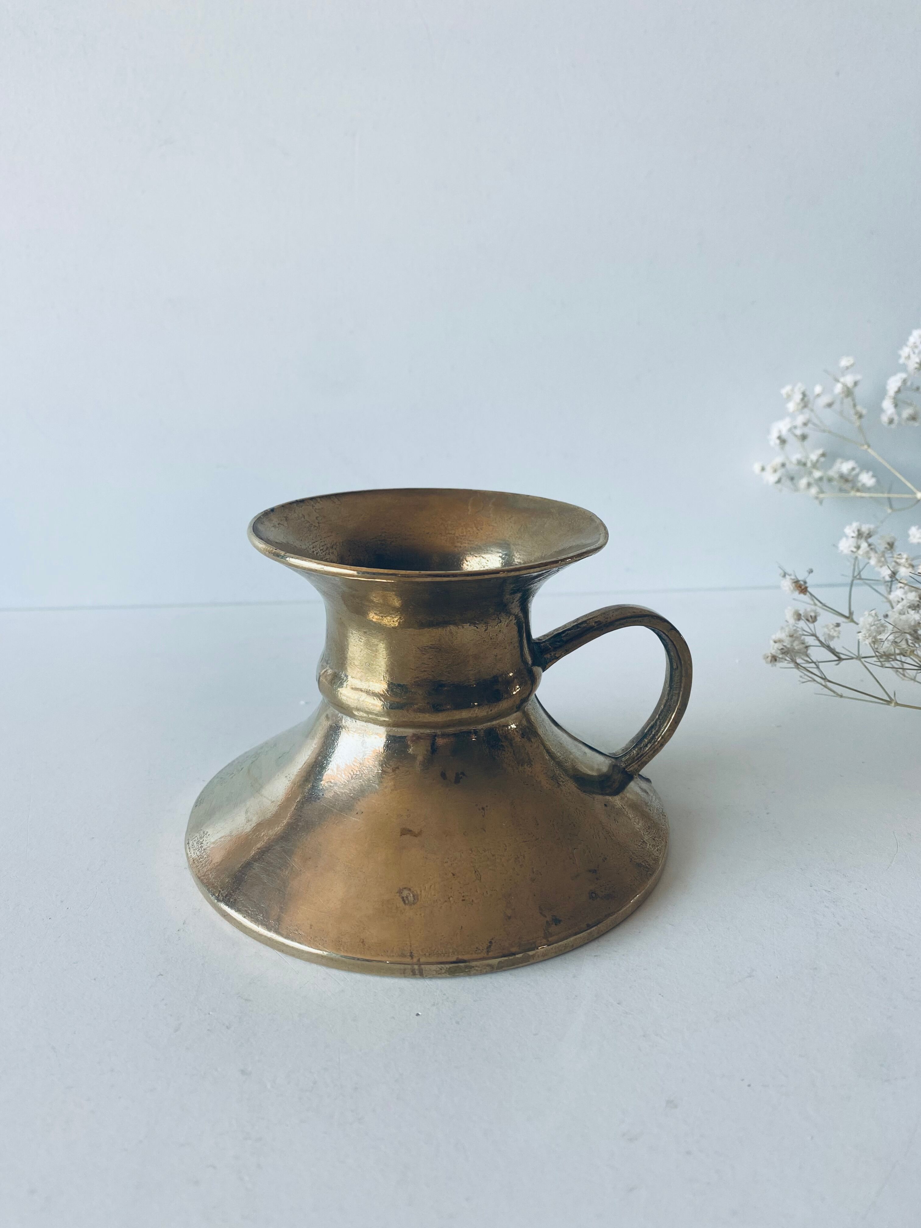 Old bronze church candle holder