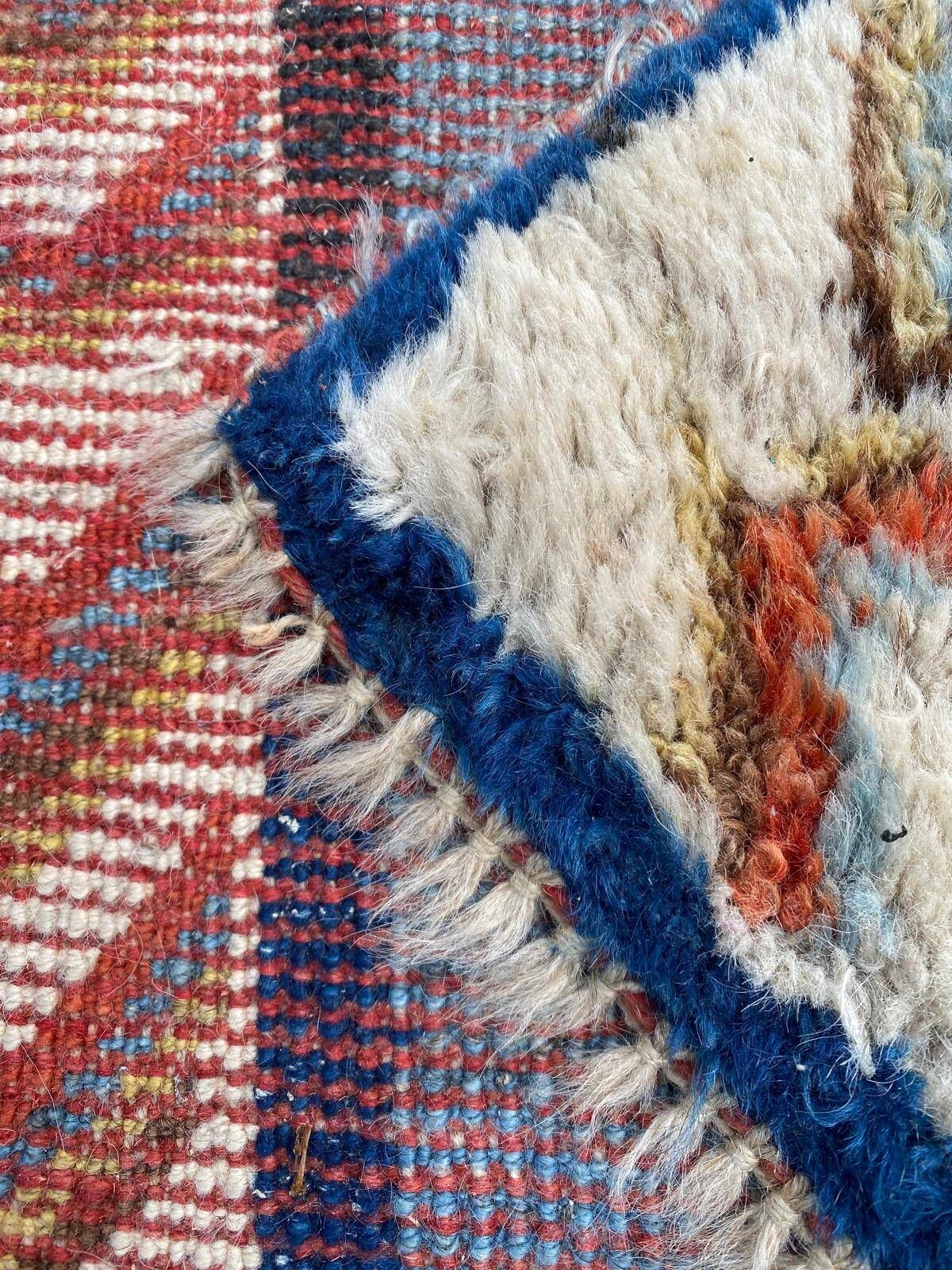 Handmade wool Berber rug with long pile, 110x150cm.