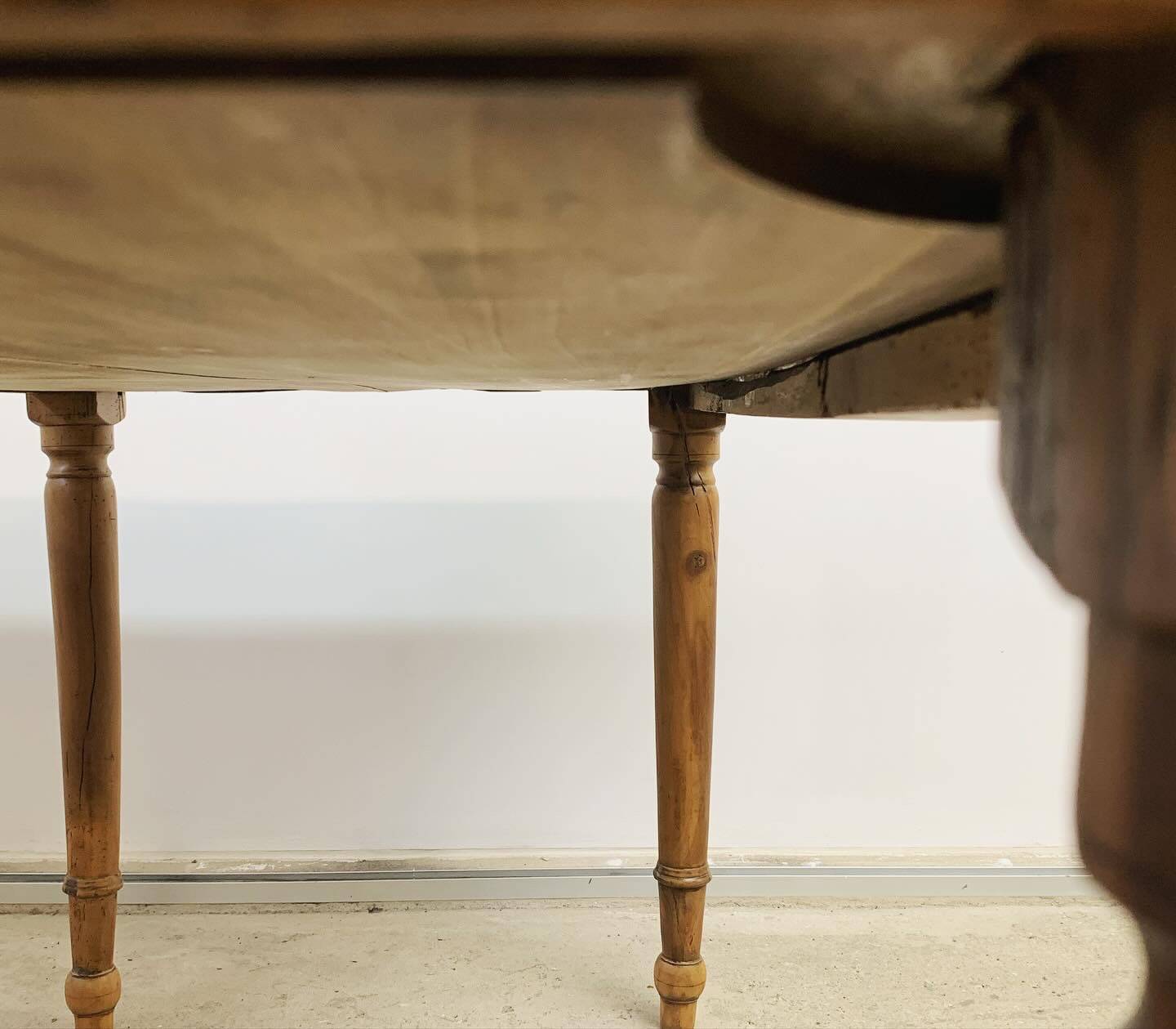 Old walnut farm table with pulls