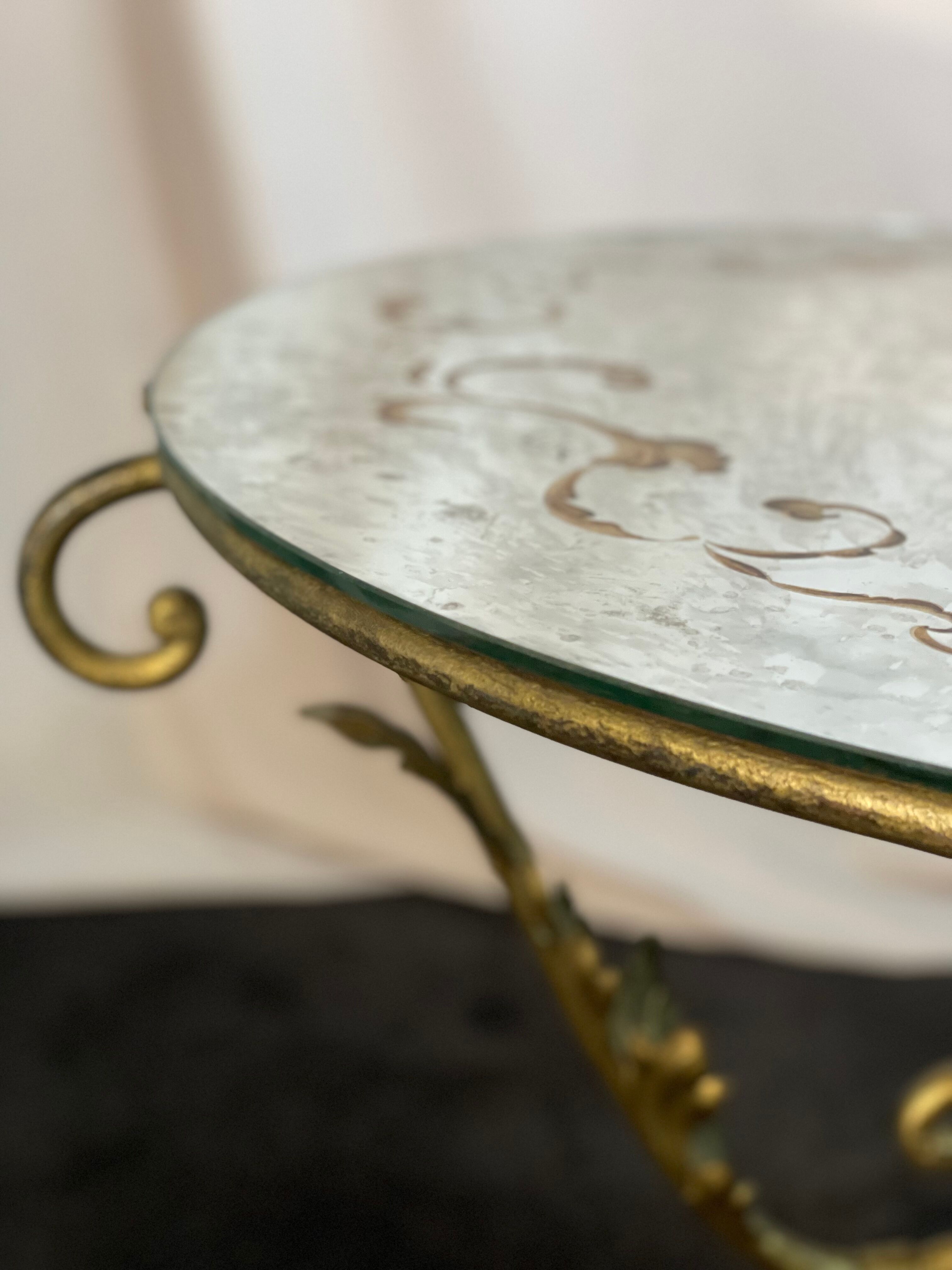 Round coffee table base in gilded wrought iron beautiful top enamelled glass 50s