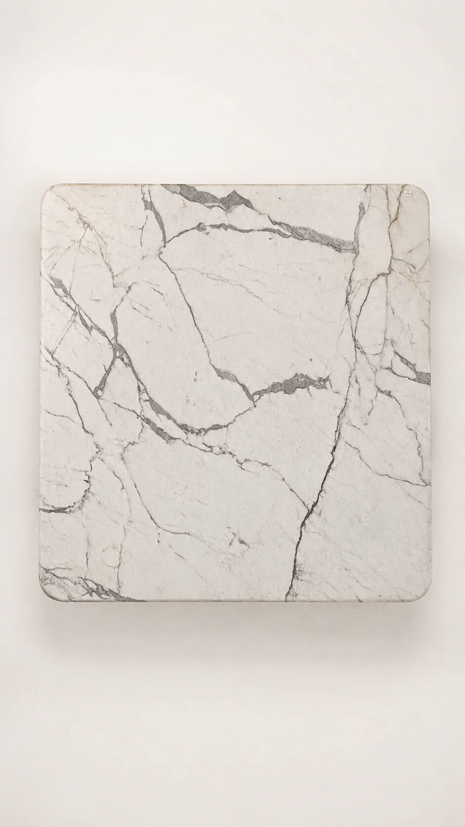Table with a solid Carrara marble base.