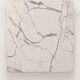 Table with a solid Carrara marble base.