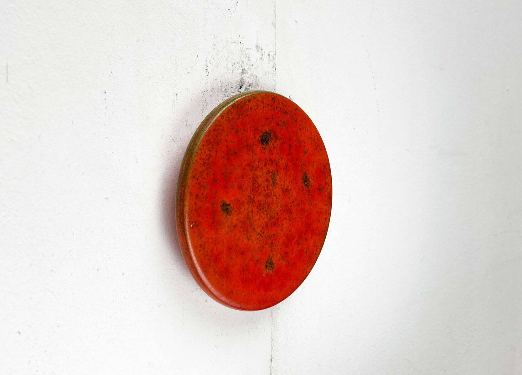 Mid-century modern Danish studio pottery, orange wall coat rack by Signe Boesen Northroup, 1960s.