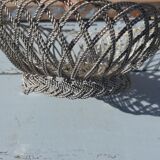 flat basket cut center table in woven metal