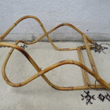 Rattan bassinet on folding support