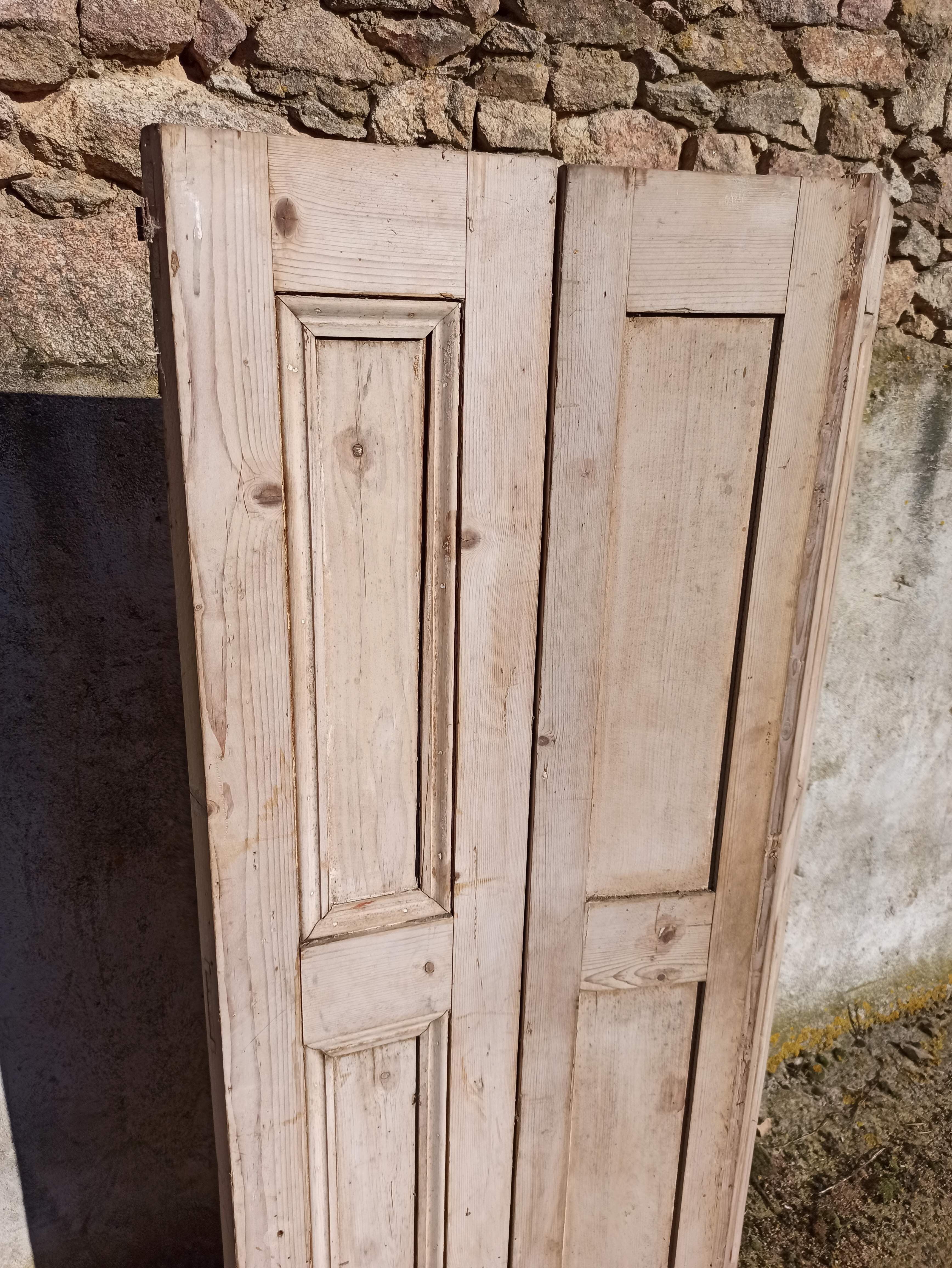 Old trio of wooden screen doors