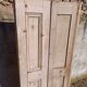 Old trio of wooden screen doors