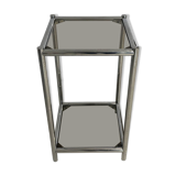 Bolster or end table in chrome steel with smoked window.