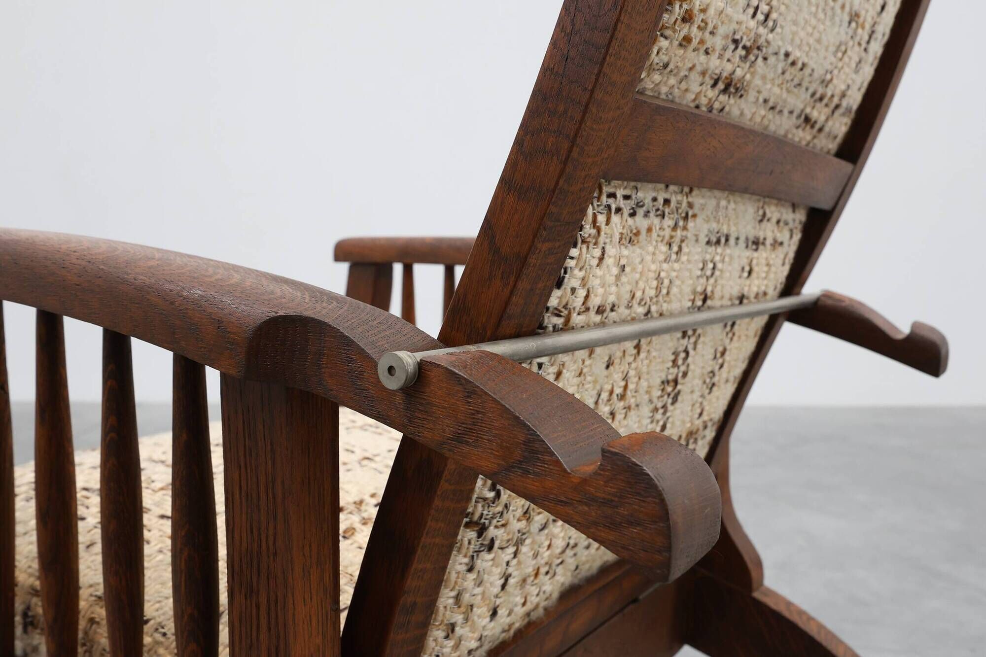 Arts & Craft oak armchair with spindle sides and tweed upholstery, Belgium