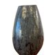Vintage stone vase with worked fossil