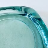 Glass tiled pocket emptier