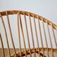 Vintage adult rattan armchair from the 1960s.