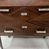 Art Deco chest of drawers with cut sides in mahogany veneer, 20th century