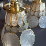 Pair of portable lamps with mother-of-pearl lampshades and brass.