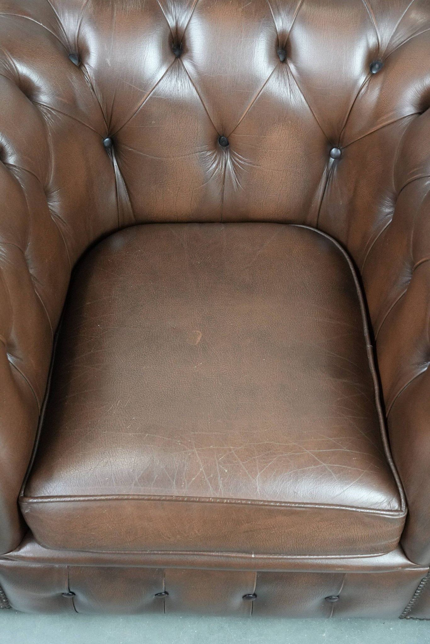 Brown cowhide leather Chesterfield club armchair in English style