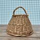Round basket with vintage rattan handle