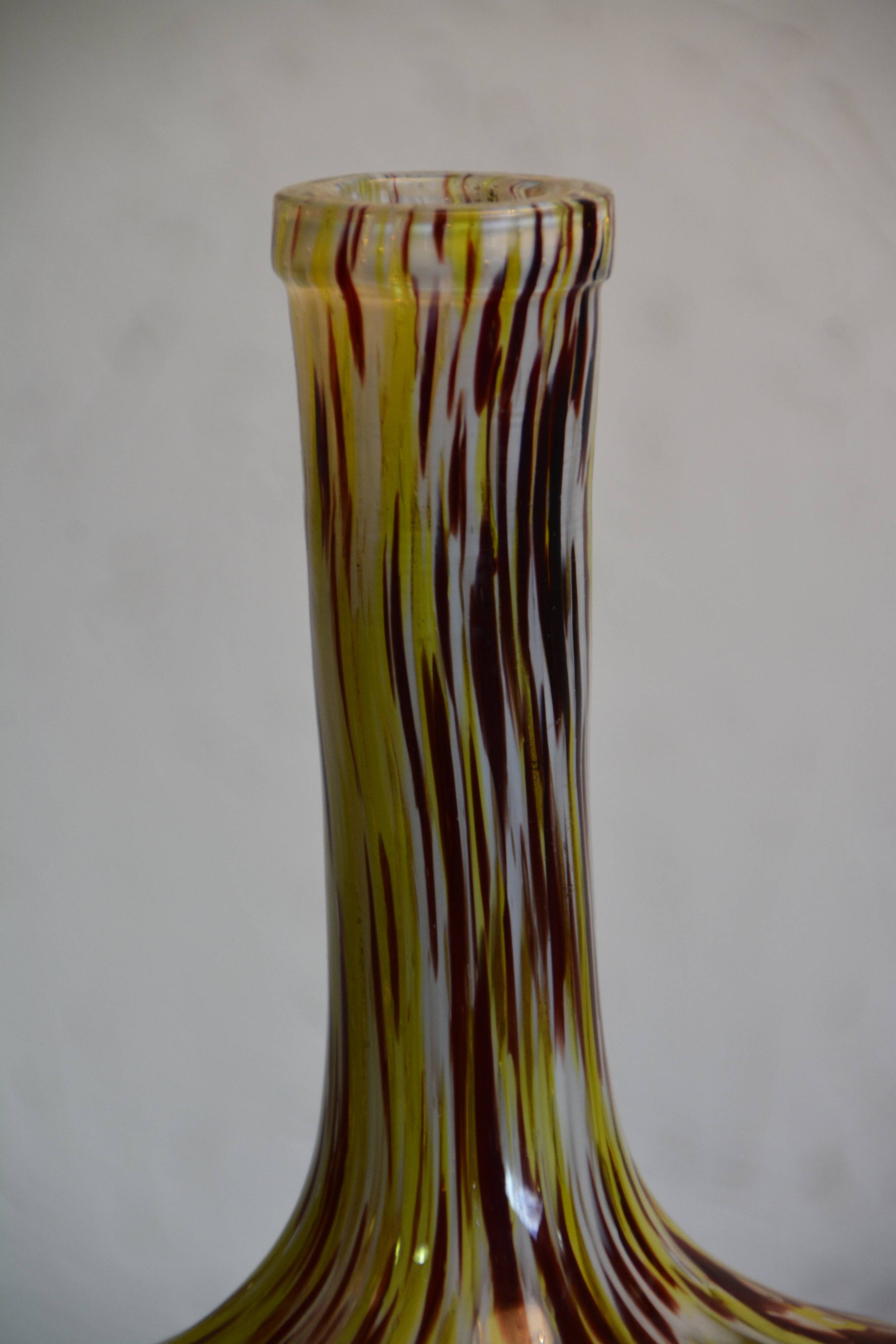 Yellow and white speckled decanter