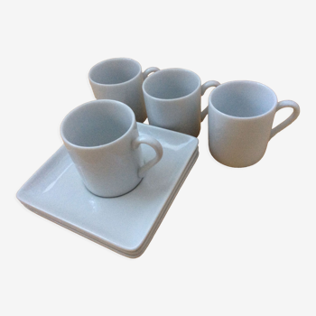 4 coffee cups and saucers