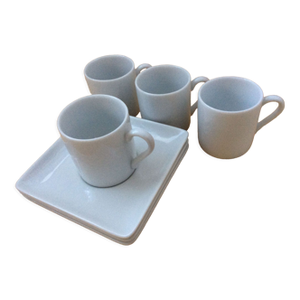 4 coffee cups and saucers