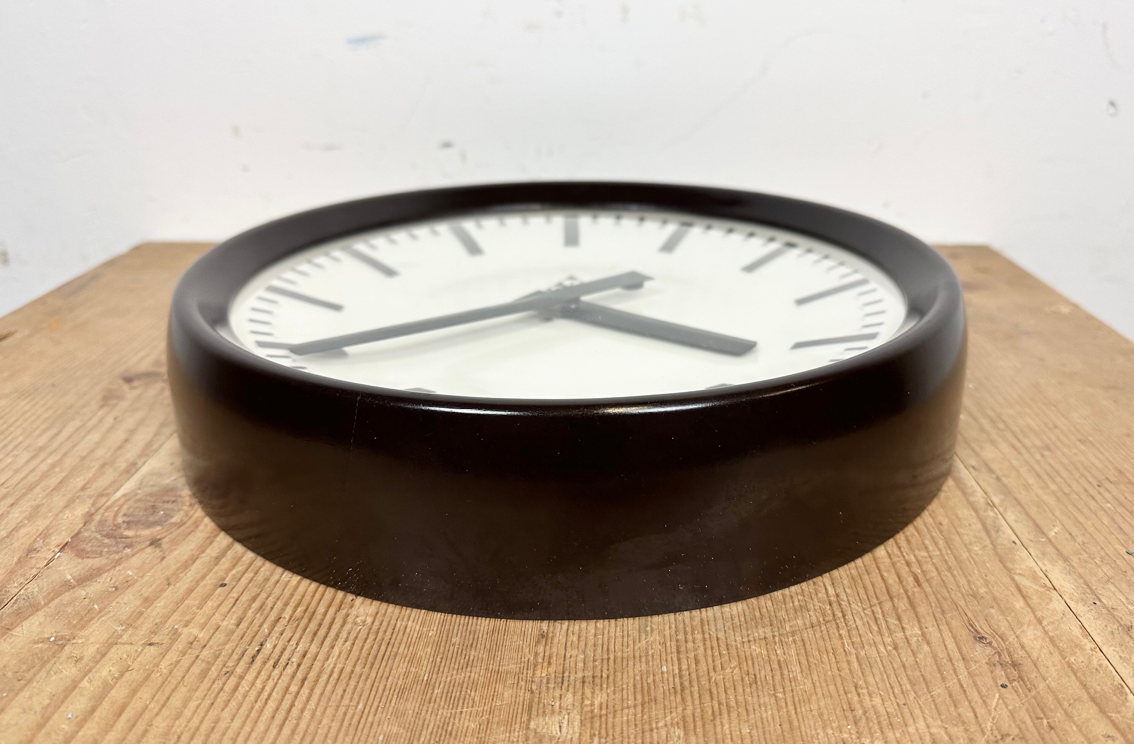 Industrial bakelite factory wall clock from Pragotron, 1960s