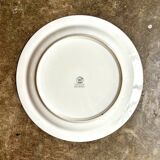 Plat rond A. Vignaud en porcelaine de Limoges blanche et dorée