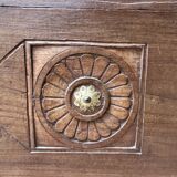 Teak chest from Burma with carved rosettes.