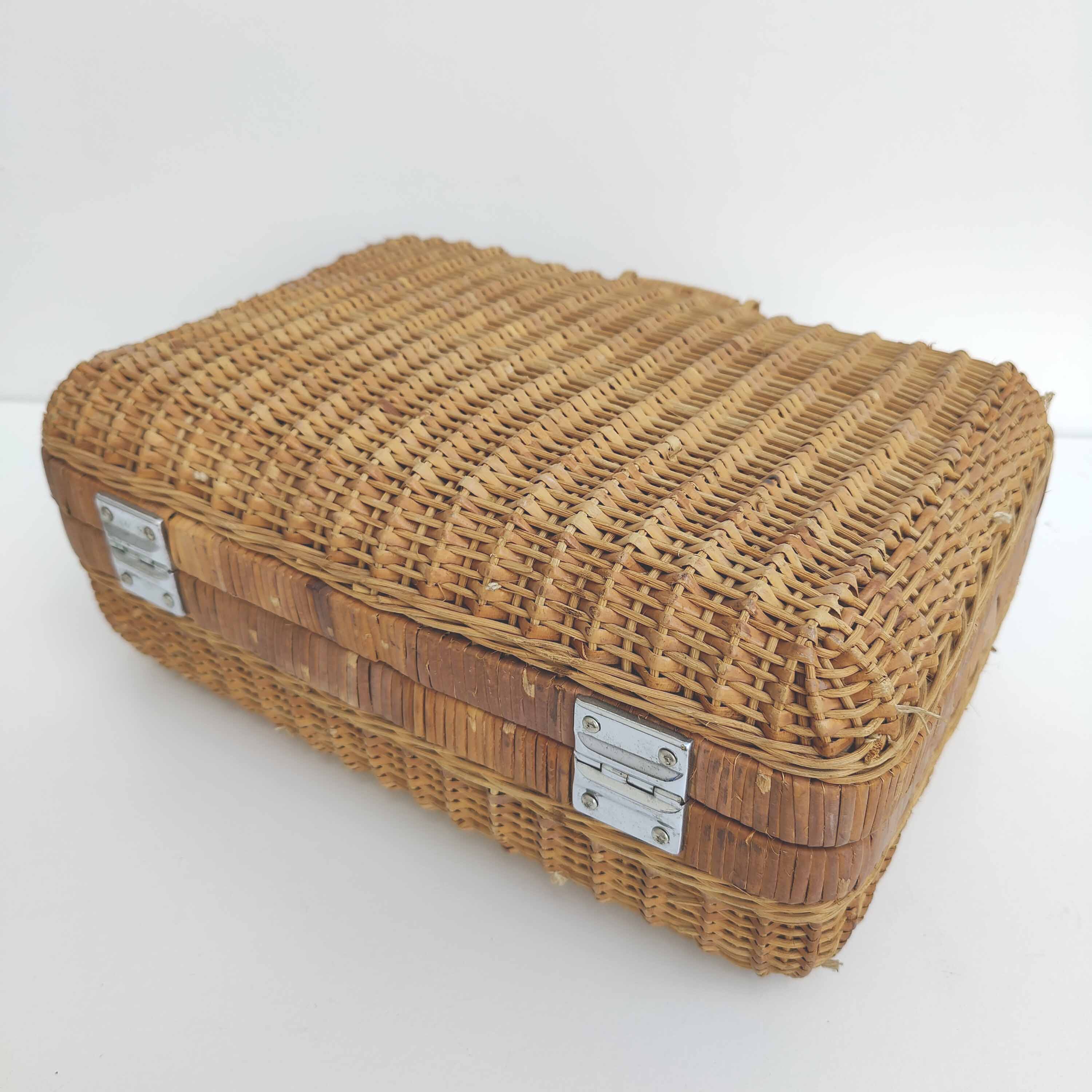 Rattan suitcase and wicker interior flowered