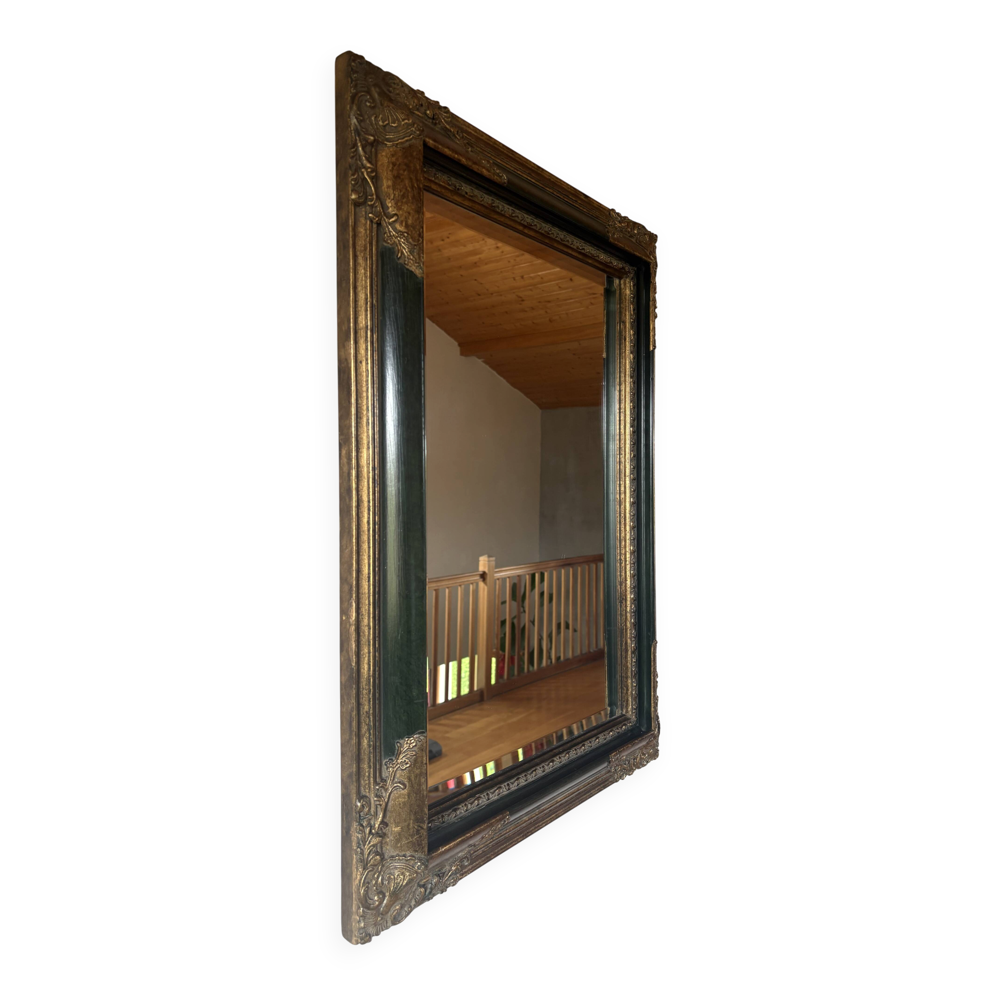 Miroir ancien style Napoléon III en bois noirci et doré – cadre d’orig