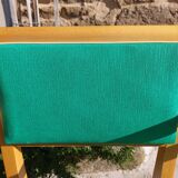 3 vintage bridge chairs with rounded armrests.