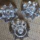 A set of 3 vintage star flower glass candle holders.