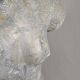 Bust of a woman, nude, antique style