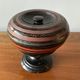 Round covered standing box in lacquered wood, Japanese work of the 1930s.