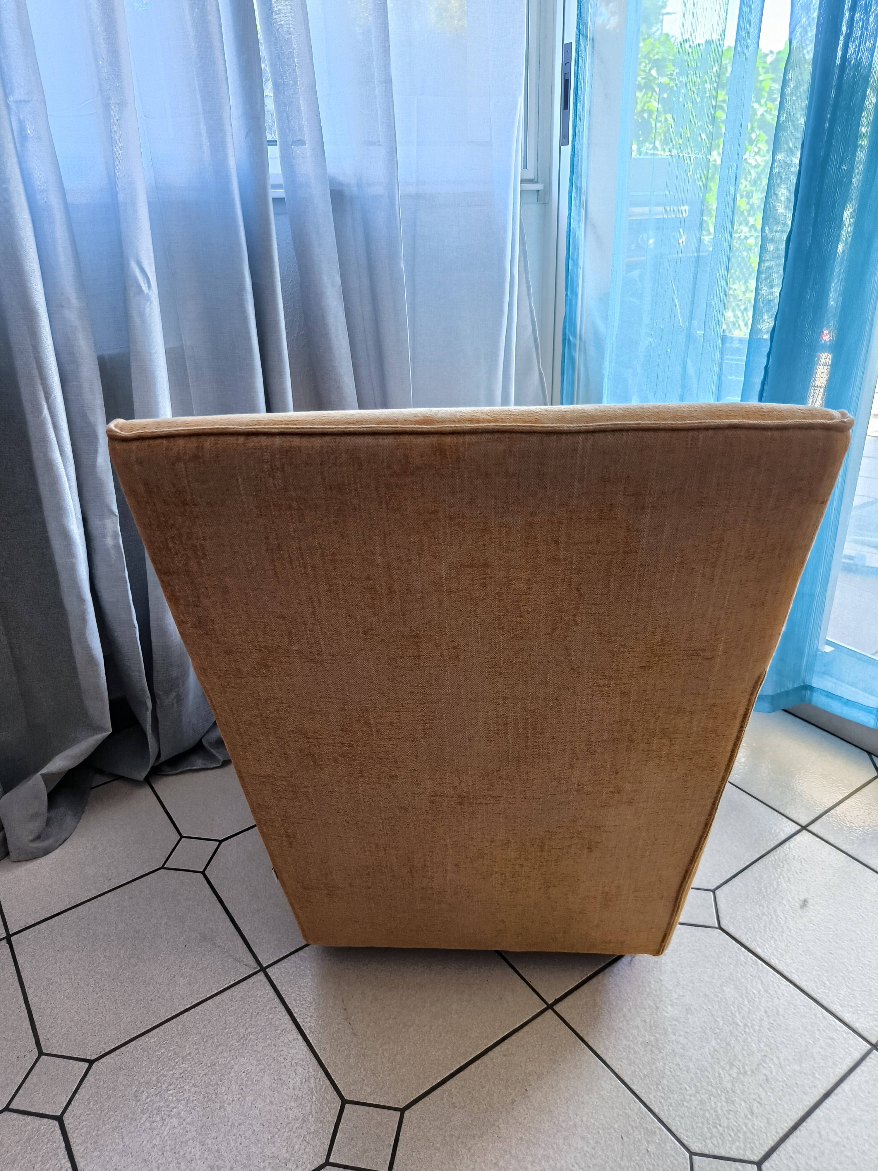 Doda armchair with armrests