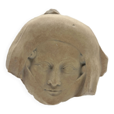Mask of a woman from the 14th century – reproduction from the Louvre Museum