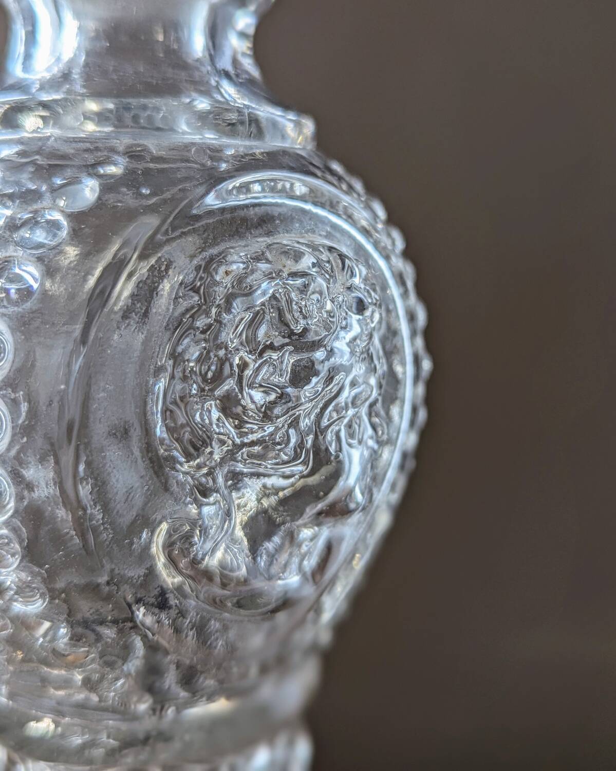 Legras candlestick in molded glass with faces in relief, vintage carafe
